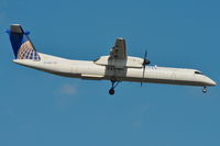 N214WQ @ KIAD - On finals for r/w 19L - by Robert Kearney
