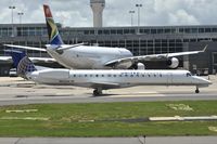 N832HK @ KIAD - Taxiing out for departure - by Robert Kearney