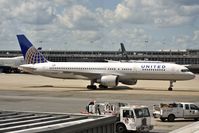 N594UA @ KIAD - Taxiing out for departure - by Robert Kearney