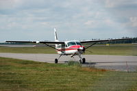 SE-KYI @ ESKN - Cessna 208B operated by Nord Flyg parked at Nyköping Skavsta airport, Sweden. - by Henk van Capelle
