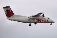C-GTBP @ CYOW - Approaching rwy 32 and on short final. - by Dirk Fierens