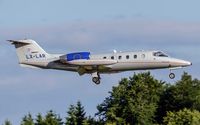 LX-LAR @ ELLX - on final RW24 - by Friedrich Becker