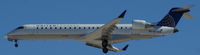 N718SK @ KLAS - Sky West (United express cs.), is landing RWY 25L at Las Vegas Int´l(KLAS) - by A. Gendorf