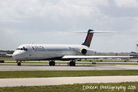 N967DL @ KSRQ - Delta Flight 2298 (N967DL) taxis at Sarasota-Bradenton International Airport - by Donten Photography