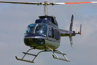 G-JACI @ EGBT - being used for ferrying race fans to the British F1 Grand Prix at Silverstone - by Chris Hall