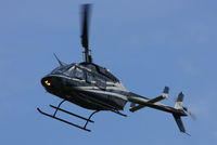 G-RCOM @ EGBT - being used for ferrying race fans to the British F1 Grand Prix at Silverstone - by Chris Hall