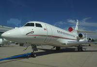 C-GMGX @ LOWW - Magna International Falcon 7X