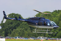 G-JACI @ EGBT - being used for ferrying race fans to the British F1 Grand Prix at Silverstone - by Chris Hall