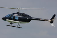 G-WIIZ @ EGBT - being used for ferrying race fans to the British F1 Grand Prix at Silverstone - by Chris Hall