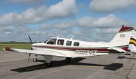 N6024Z @ KAXN - Beech A36 Bonanza on the line. - by Kreg Anderson