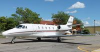 N579QS @ KAXN - Cessna 560XL Citation Excel on the ramp. - by Kreg Anderson