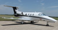 N670AS @ KAXN - Embraer EMB-500 Phenom 100 on the ramp. - by Kreg Anderson