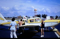 N4188R - The original paint scheme. The original owners taking the plane to the Bahamas probably in the late 1960's. - by Garry R. Lane