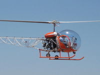 N2899B - 99B about to land - by helicopter206