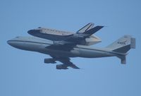 OV-105 @ MCO - Endeavor on back of 747 flying over MCO - by Florida Metal