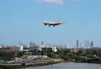 D-ALPJ @ MIA - Air Berlin landing over Dolphin Expressway with Downtown Miami in the distance