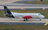 N348AG @ TPA - Silver Saab 340 - by Florida Metal