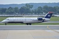 N408AW @ KDCA - Taxiing to parking after arrival - by Robert Kearney