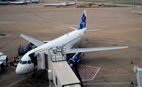 N568JB @ KDFW - Gate E10 DFW  Blue Sapphire - by Ronald Barker