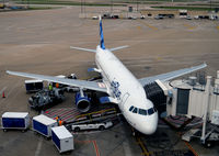 N568JB @ KDFW - Gate E10  DFW  Blue Sapphire - by Ronald Barker