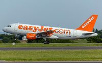 G-EZDV @ ELLX - departure via RW06 - by Friedrich Becker