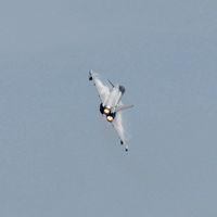 ZK344 - Off airport. Typhoon coded BQ from 29(R) Squadron RAF displaying on the first day of the Wales National Air Show, Swansea Bay, UK. - by Roger Winser