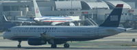 N665AW @ KLAX - US Airways, shortly after landing at Los Angeles Int´l(KLAX) - by A. Gendorf