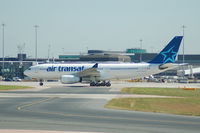 C-GGTS @ EGCC - Air Transat Airbus A330 C-GGTS taxiing at Manchester Airport . - by David Burrell