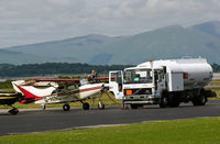 G-HIND @ EGEO - Taking fuel at Oban Airport.