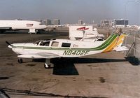 N8402F @ LAX - Took this in early 80's at LAX on the South side (cargo complex).
Don't remember the incident but aircraft suffered a ground collision of some kind. - by Paddlefoot
