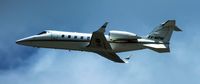 XA-MDM @ MMUN - Learjet 60 departs on runway 12R. - by Mark K.