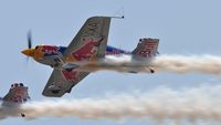 D-EVXA - Off airport. Red Bull Matadors. D-EVXA displaying with D-EYXA on the first day of the Wales National Air Show, Swansea Bay, UK. - by Roger Winser