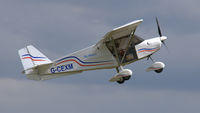 G-CEXM @ EGTH - 42. G-CEXM departing Shuttleworth (Old Warden) Aerodrome. - by Eric.Fishwick