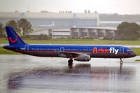 G-MIDM @ EHAM - Airbus A321-231 [1207] (Arkefly) Amsterdam-Schiphol~PH 10/08/2006. Taken during a rainstorm. - by Ray Barber