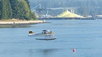 C-FAXI @ CYHC - Harbour Air #205 landing in Coal Harbour.
