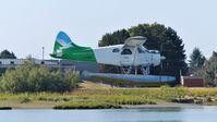 C-FEBE @ CYVR - Westcoast Air #218 about to land on the Fraser River. - by M.L. Jacobs