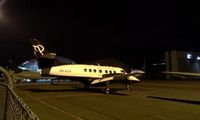 ZK-ECJ @ NZAA - Under early morning floodlights at AKL. - by magnaman