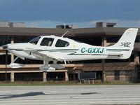 C-GXXJ @ YKZ - 2003 Cirrus SR22 landing on runway 33 at Buttonville, Ontario (YKZ) - by Ron Coates