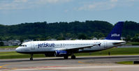 N652JB @ KDCA - Takeoff DCA - by Ronald Barker