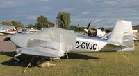C-GVJC @ KAXN - Vans RV-7A in overflow parking. - by Kreg Anderson