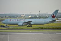 C-GHLK @ CYYZ - Being towed around to parking