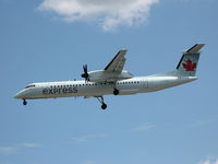 C-GGCI @ YYZ - This Dehavilland Dash 8 is on final for 24L at Toronto's Pearson Airport - by Ron Coates