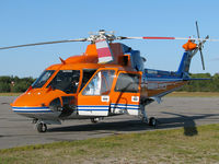 C-FABH @ CYQA - The crew of this medevac helicopter just climbed on board in response to their next mission. - by Chris Coates