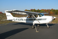 C-FAVN @ CNK4 - Resting on the main ramp with beautiful Fall colours beside the runway. This Skyhawk lives here at the Parry Sound airport. - by Chris Coates