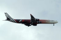 A6-EHJ @ EGLL - Airbus A340-642X [933] (Etihad Airways) Home~G 10/07/2012. On approach 27L wearing 2012 Grand Prix titles.