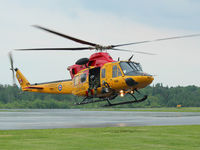 146491 @ YPQ - This 1997 Bell Griffon RCAF Rescue helicopter lands in Peterborough, Ontario for fuel. - by Ron Coates