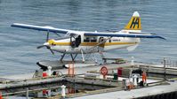 C-FODH @ CYHC - Harbour Air #307 recently arrived and unloaded at terminal in Coal Harbour.