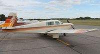 N1153W @ KAXN - Mooney M20J on the line.