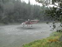 N795HT - WATER DIPPING ON THE NORTH FORK OF THE CLEARWATER RIVER IDAHO UPSTREAM FROM AQUARIUS CAMPGROUND FIGHTING FIRE NEAR SHEEP SADDLE 8-1-13 - by MARTY WIETERS