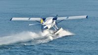 C-FITF @ CYHC - Harbour Air #303 taking off in Coal Harbour. - by M.L. Jacobs